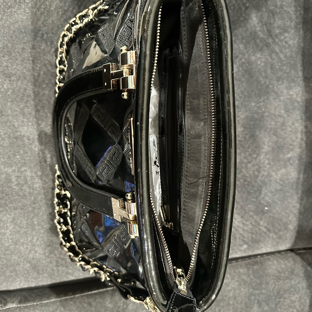 Versace checkered treated leather black bag.